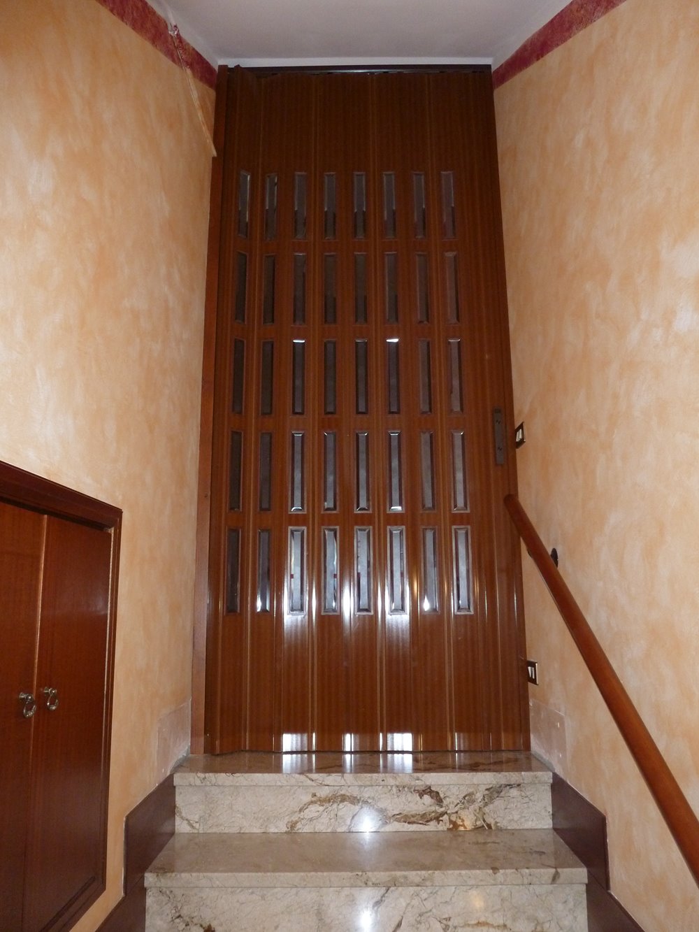 Porte a soffietto con inserti 